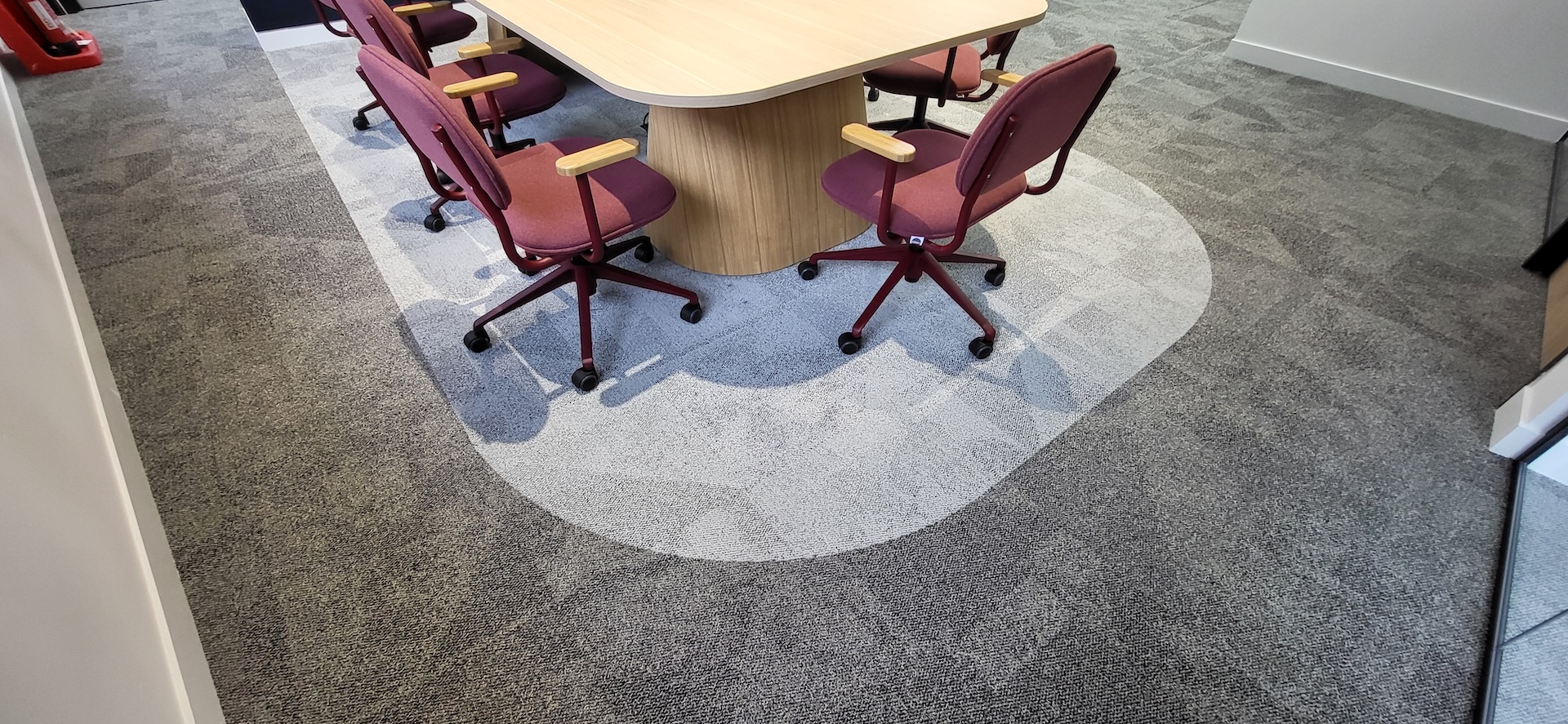 We were invited to work on this project with Main Contractors AIS, near to Blackfriars Bridge. The installation included Paver carpet tiles (with an 84% recycled content), Terazzo vinyl tiles, which have an attractive stone-effect embossing, and Spacia wood-effect LVT.

The areas for LVT installation required careful preparation. Firstly, the existing concrete subfloor was thoroughly cleaned, after which our team applied a specialist smoothing compound to achieve a fine surface for ready for the LVT planks to be installed through the corridor and refreshment points - and to achieve the best transition between the carpet and LVT.

Finally, a new entrance matwell was installed to prevent the ingress of dirt and keep the floors looking pristine.