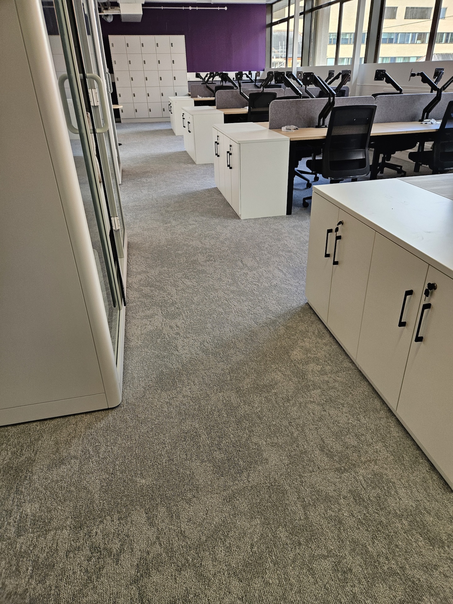 The refurbishment of this large research laboratory building included two different types of safety floor, as well as wood-effect LVT and carpet tiles.

Great care was taken to achieve the clean lines with simple elegance throughout.

The stairs were fitted with wood effect LVT in a brick-bond pattern, each edged with Gradus nosings.
