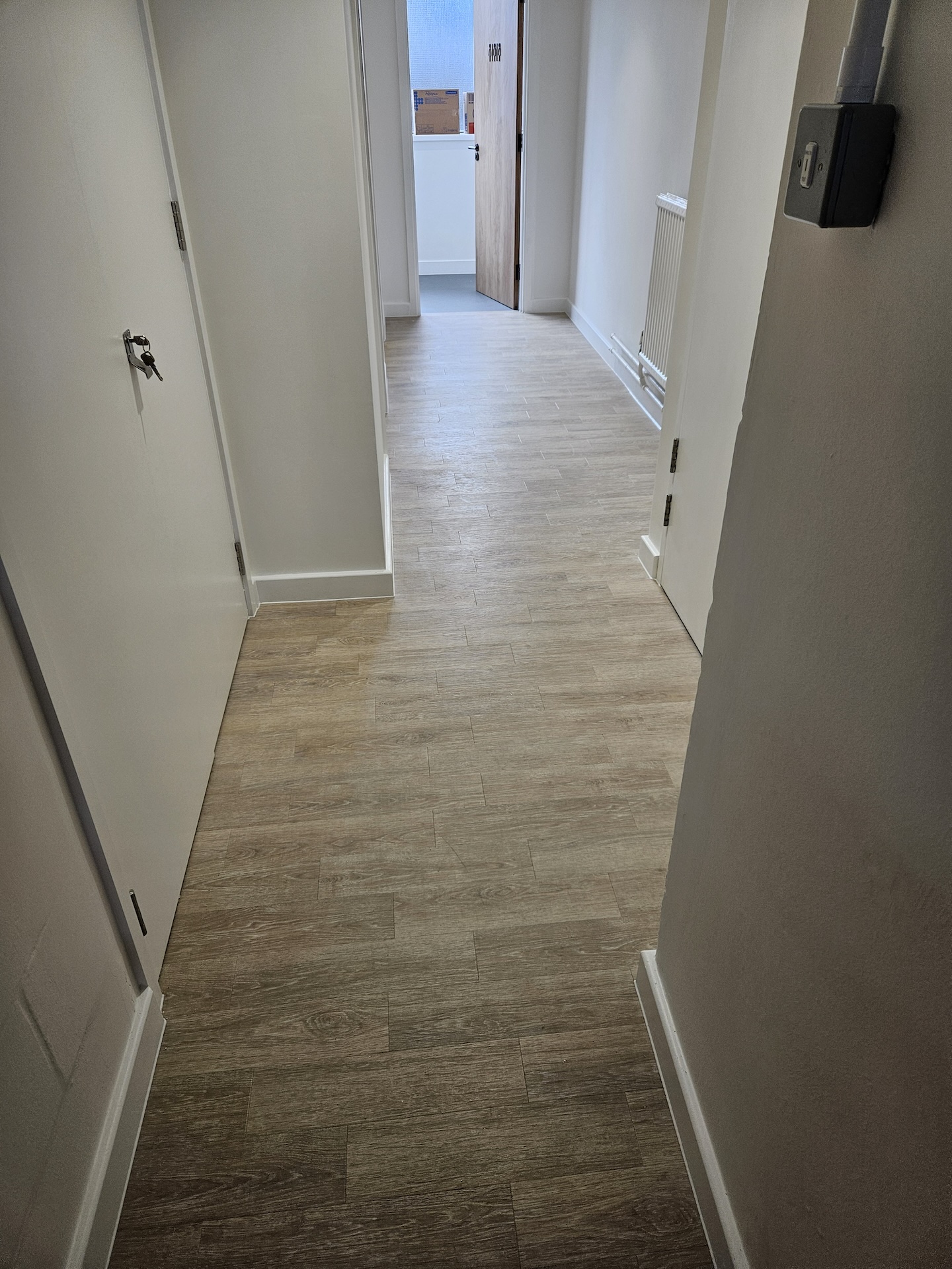 The refurbishment of this large research laboratory building included two different types of safety floor, as well as wood-effect LVT and carpet tiles.

Great care was taken to achieve the clean lines with simple elegance throughout.

The stairs were fitted with wood effect LVT in a brick-bond pattern, each edged with Gradus nosings.
